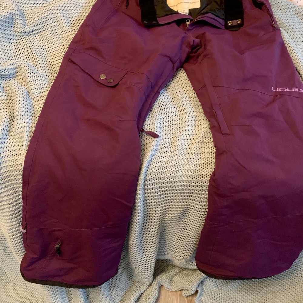 like new snowboard-ski pants are water repellent